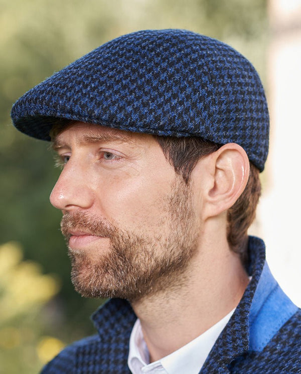 Harris Tweed flatcap "Henry Cap" in blauw-zwarte pied-de-poule